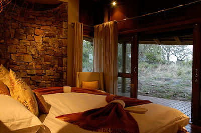 A bedroom at Buffalo Ridge Safari Lodge
