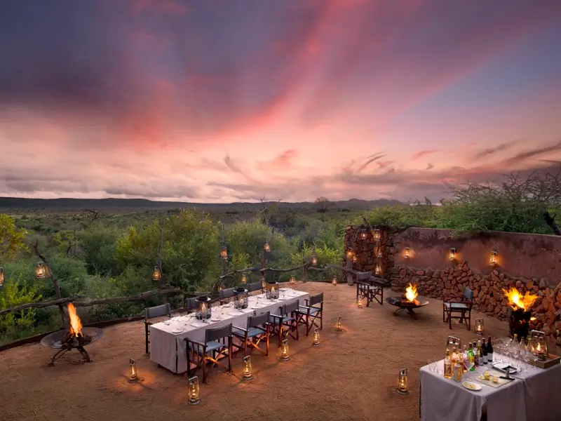 Dining in the boma at Madikwe Safari Lodge Kopano