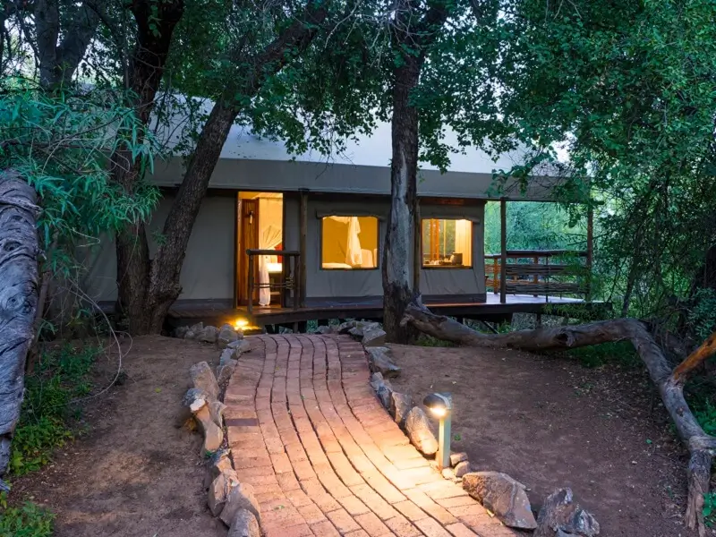 View from the outside of a tented suite at Thakadu River Camp