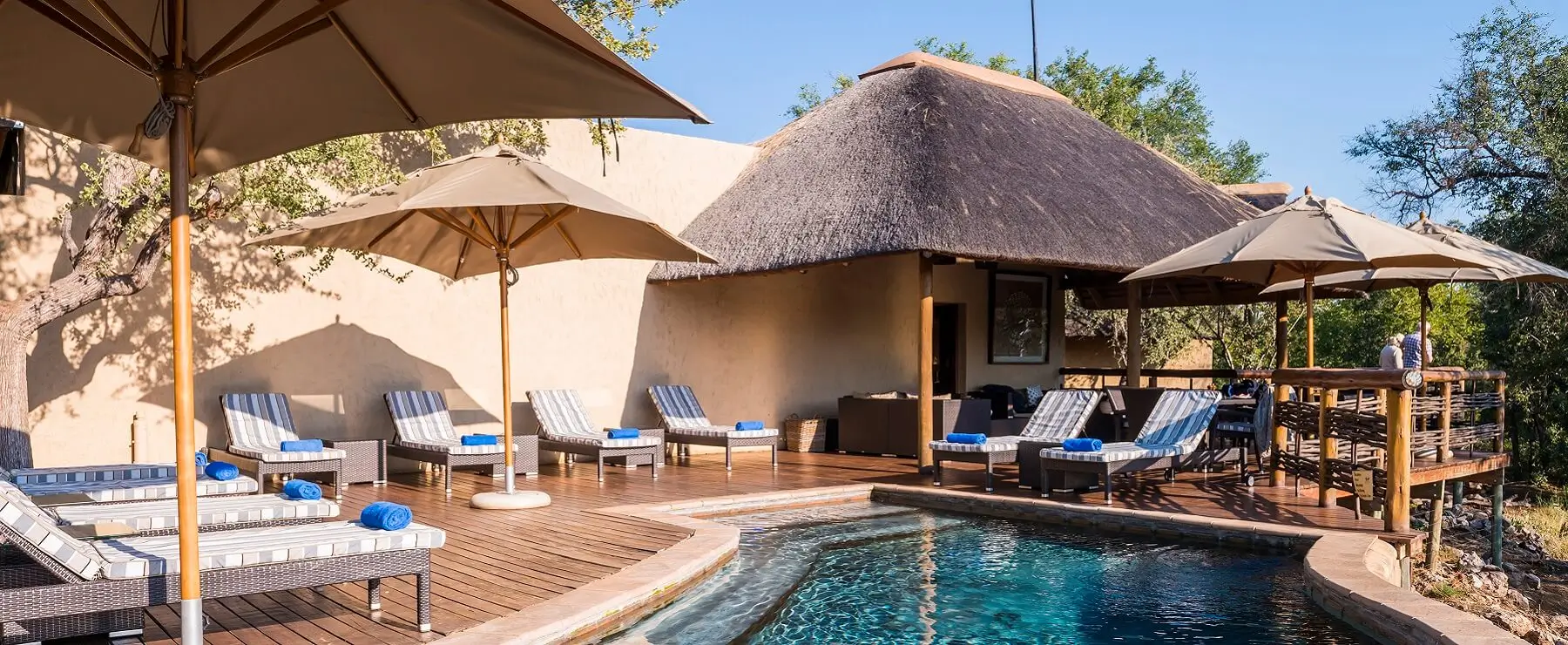 The inviting pool and deck at the main lodge at Thakudu River Camp